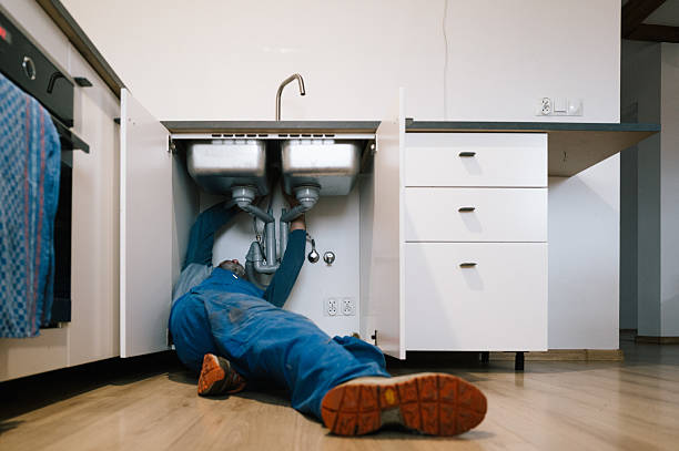 Professional Emergency Plumber technician working in Lawrence, MA